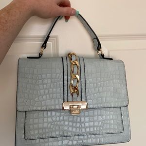 ALDO hand bag with strap.